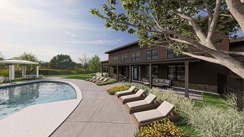 Backyard pool with loungers and modern home